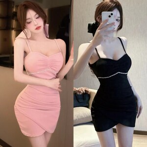 Sexy solid color suspender dress with buttocks and irregular short skirt