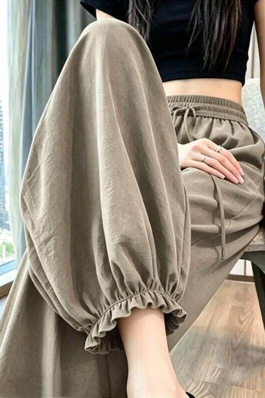 Plus-size women's ice silk sports pants, loose-fitting, thin summer casual harem pants with trendy lace trim, breathable, and cropped length