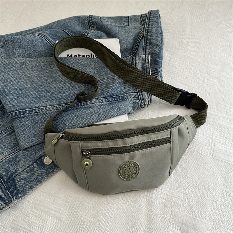 Nuevo nicho de diseño de bolso de cintura para hombres tendencia de personalidad estética 2024 verano almacenamiento de teléfonos móviles bolso de pecho de aire deportivo