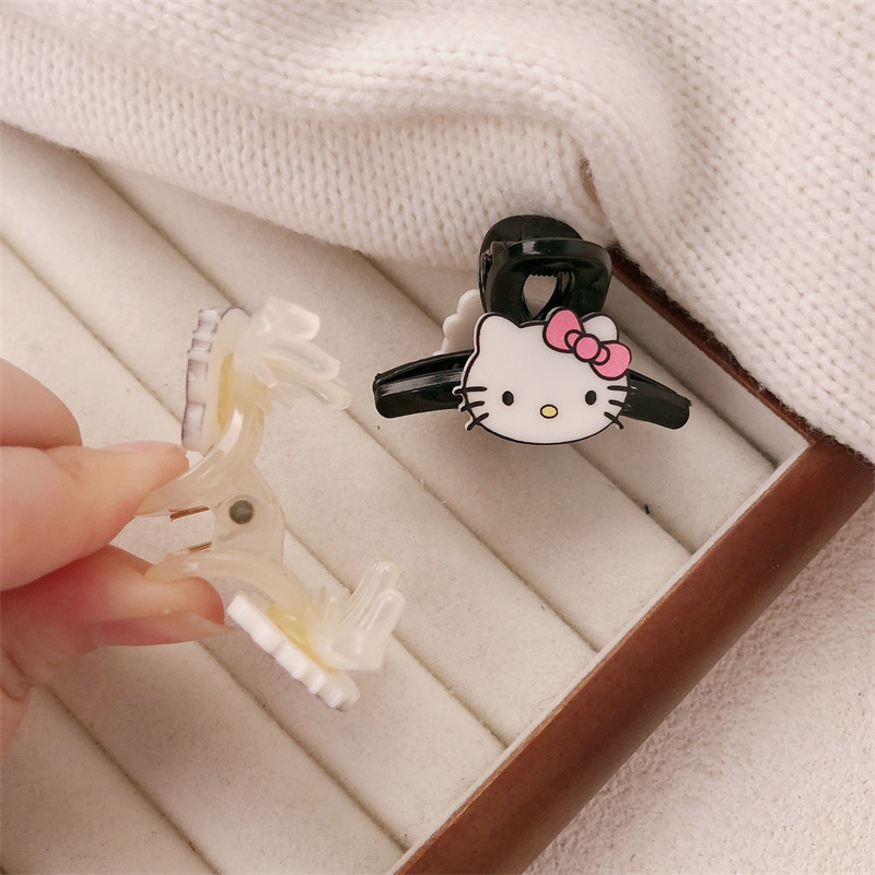 Super dulce niña acrílico gato de dibujos animados pequeño nuevo cabello de frisa agarrar nicho agarrar cabello de cabeza