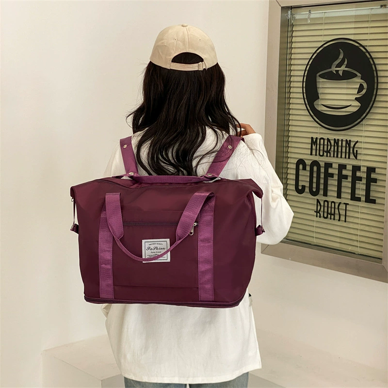 Capacious fashionable luggage travel bag to go out, worn on the shoulder
