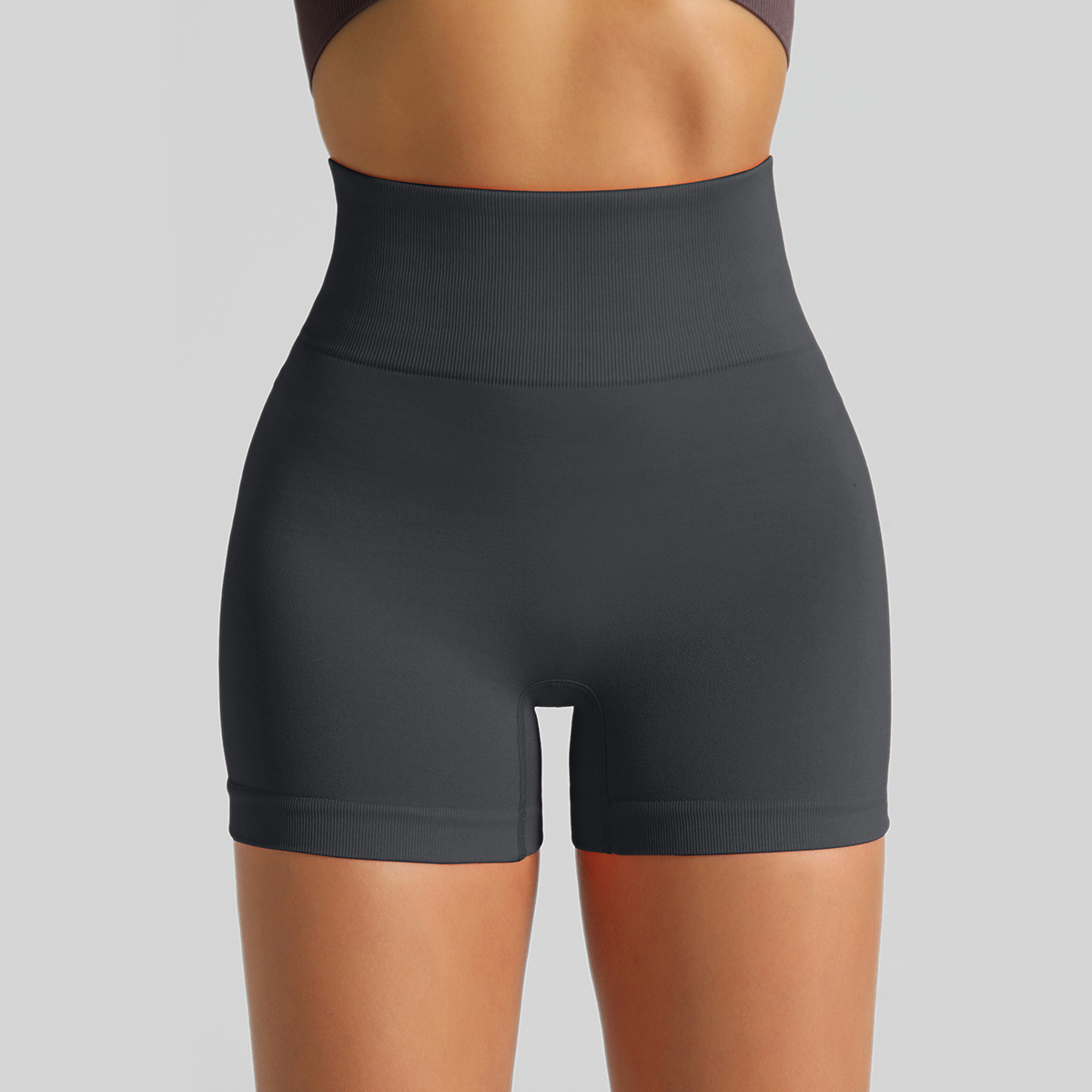 Pantalones cortos de Yoga de punto sin costuras transfronterizas Peach Hip lifting pantalones de fitness de cintura alta pantalones cortos deportivos para correr tres puntos mujeres