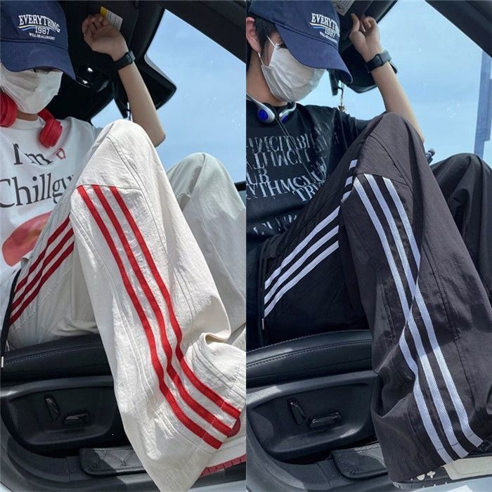 Pantalones de hielo de verano de tres barras para hombres delgados pantalones deportivos largos sueltos rectos de piernas anchas pantalones casuales de hombre