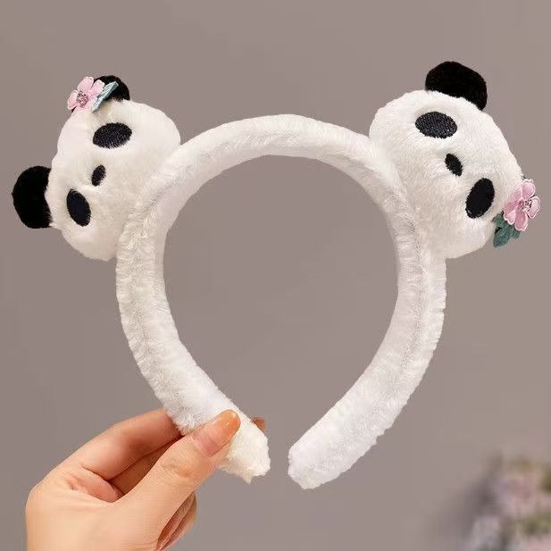 男女通用の大きいパンダのカチューシャは卸売りします。