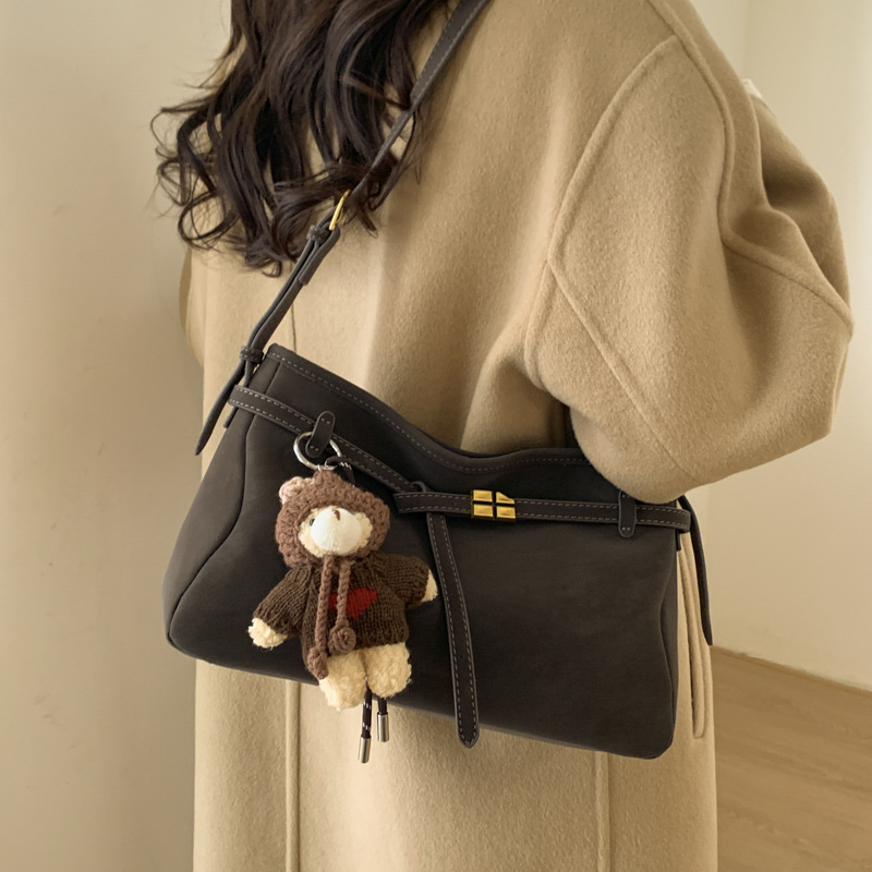 Bolsa retro de hombro debajo de la axila para mujeres 2025, otoño y invierno, nuevo estilo de alta sensación de mochila coreana, bolso de viaje al trabajo