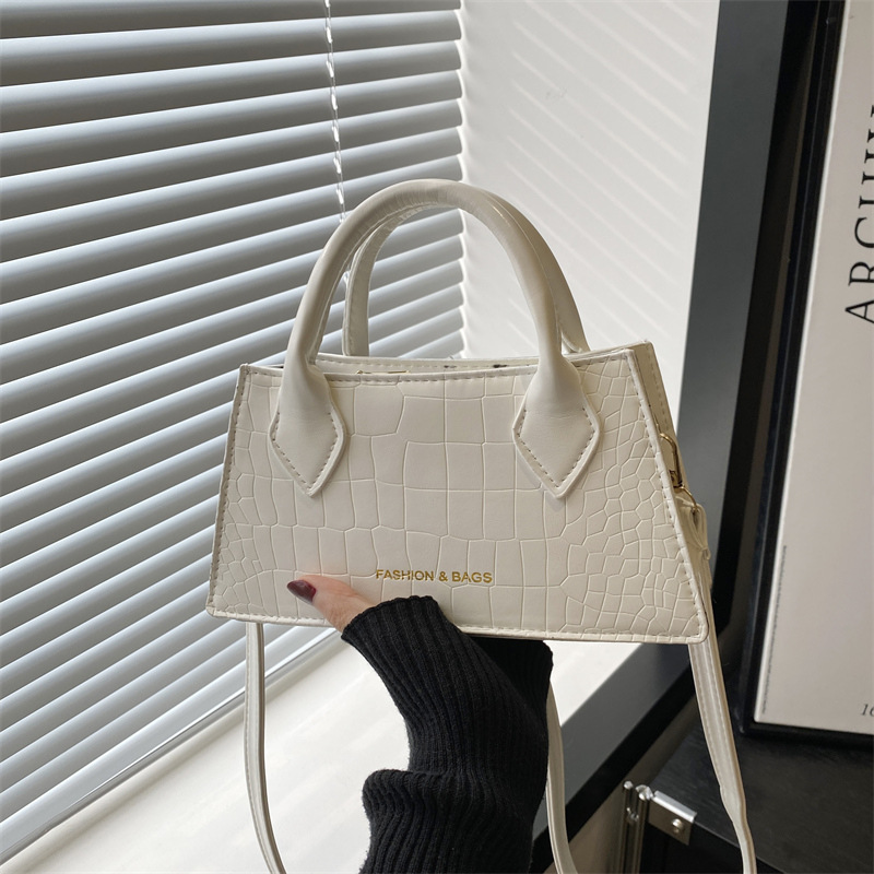 2025 nuevo bolso de mensajero casual ins textura retro simple estilo occidental pequeño bolso de mano de color sólido de moda