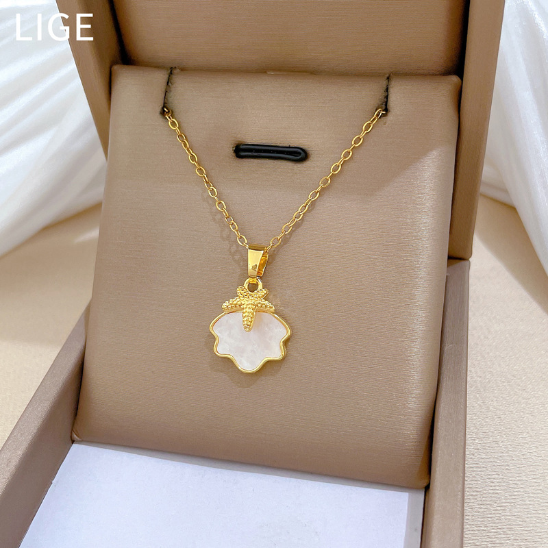 Colar de concha estrela do mar em aço titânio para mulher_voghion.com