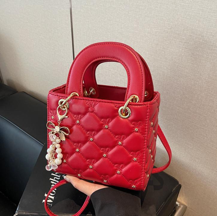 Bolsa de mano de bordado de diamante para mujeres 2025 nueva moda explosiva bolso de hombro de estilo universal estilo extranjero alta sensación de mochila