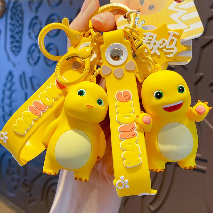 2025 nuevo arrogante pequeño dragón llavero bolso de hombre colgante muñeca joyas pareja llavero para mujeres