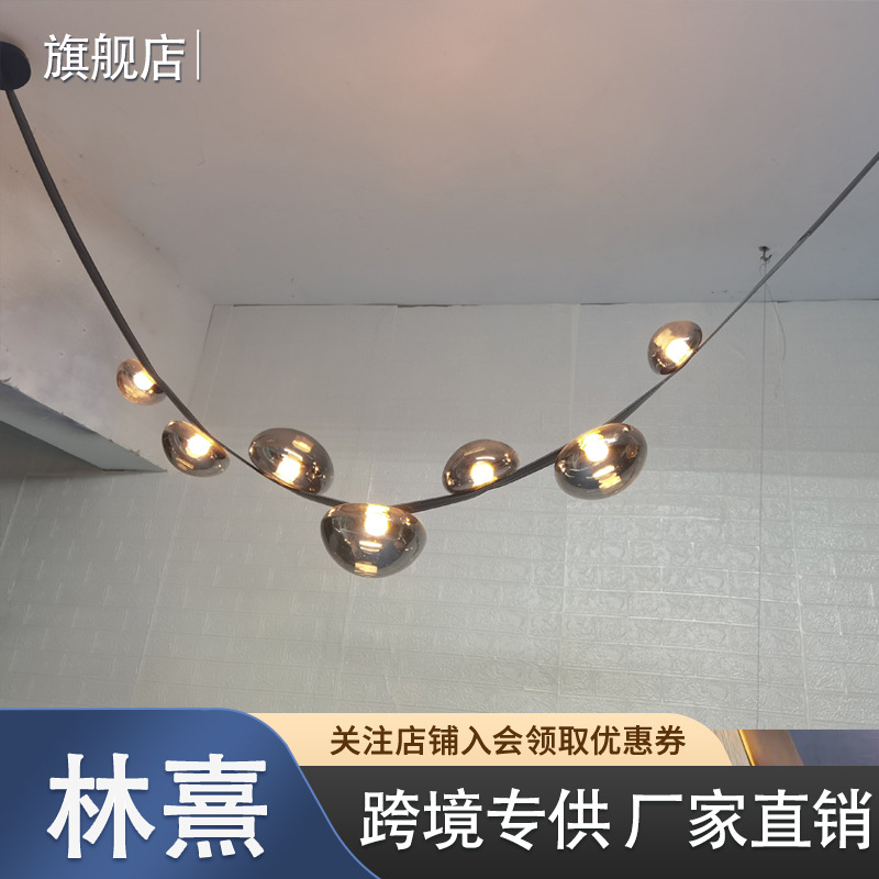 简约客厅玻璃吊灯复式挑空楼梯间设计师款餐厅灯轻奢展厅皮革吊灯