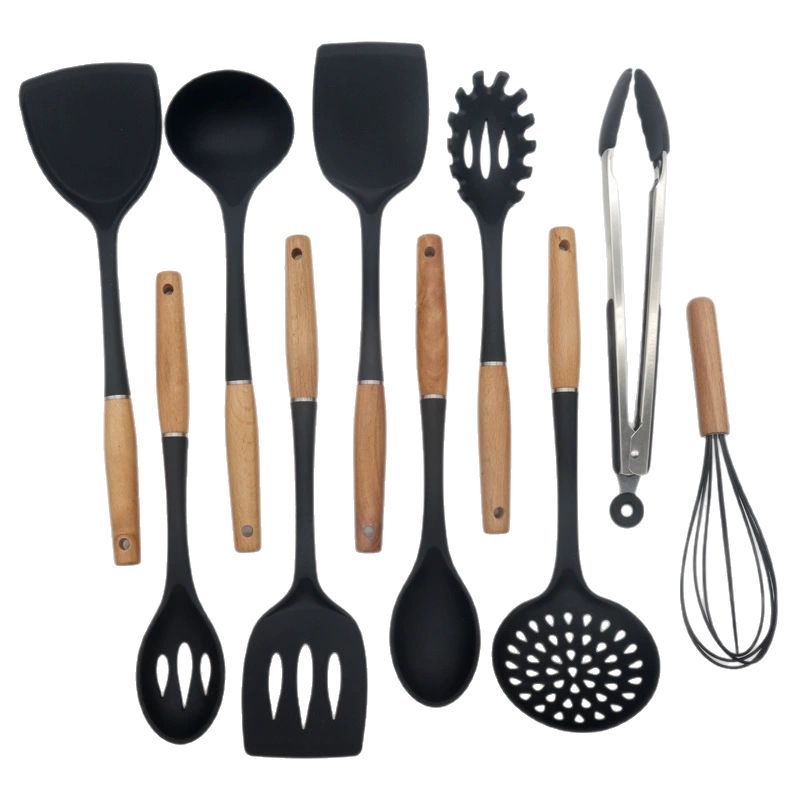 Juego de utensilios de cocina con mango de madera Juego de utensilios de cocina de silicona Juego de 9 piezas Juego de cuchara y pala Olla antiadherente Juego de utensilios de cocina de silicona