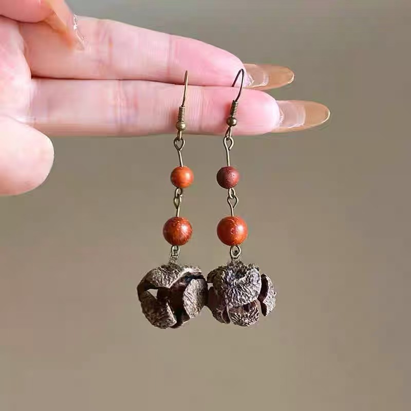 Wooden beads football fruit (pair) R5544F
