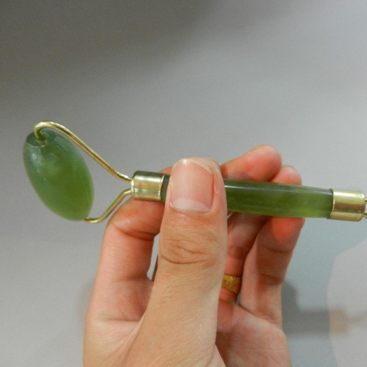 Pure Xiuyu beauty stick productos genuinos al por mayor Jade beauty container doble cabeza balanceo cara adelgazamiento equipo Un jade