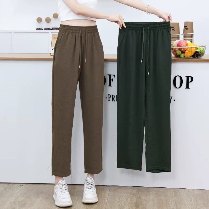 Новые летние быстросохнущие брюки для женщин среднего и пожилого возраста, свободные универсальные шаровары больших размеров, повседневные укороченные брюки для мам с прямыми штанинами.