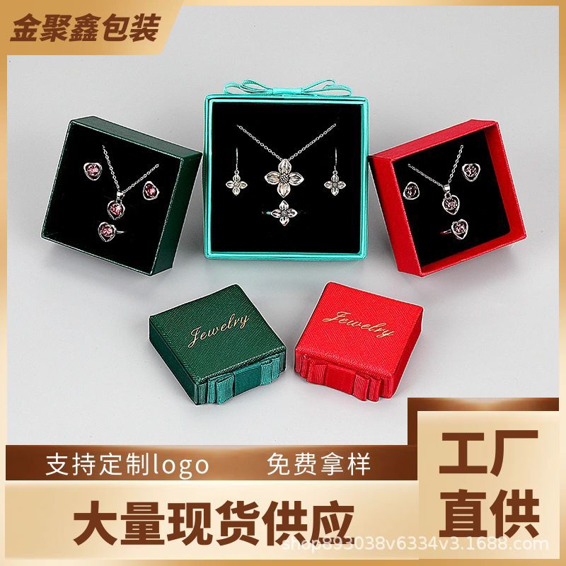 Inventario al por mayor arco cinta joyería embalaje de joyería caja de cartón simple anillo collar caja de regalo