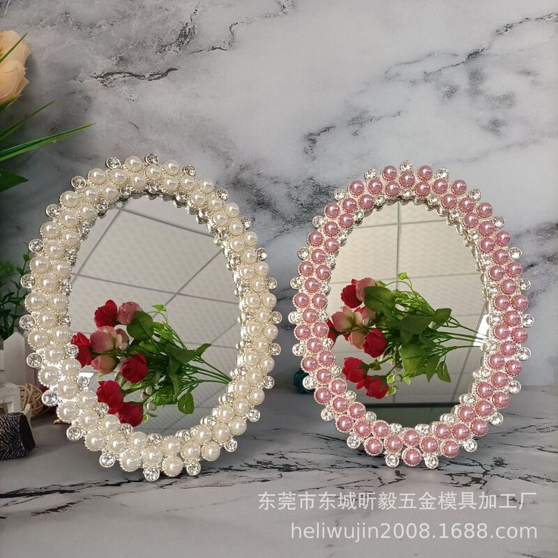 Metal photo frame mirror with pearls and diamonds, princess mirror. Simple and fashionable table mirror Metal photo frame mirror with pearls and diamonds, princess mirror. Simple and fashionable table mirror