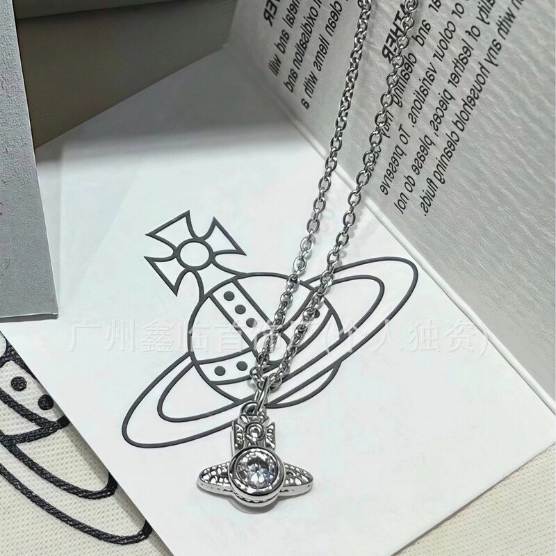 Real photos of the 2026 new West Queen mini single-diamond Saturn cubic zirconia necklace and earrings, a versatile mini design, manufactured for cross-border sales Real photos of the 2026 new West Queen mini single-diamond Saturn cubic zirconia necklace and earrings, a versatile mini design, manufactured for cross-border sales