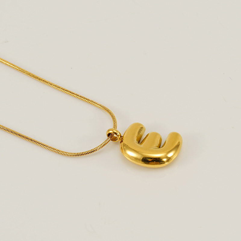 Burbujas transfronterizas 26 letras inglesas colgante brillante collar nicho universal oro acero titanio joyería collar