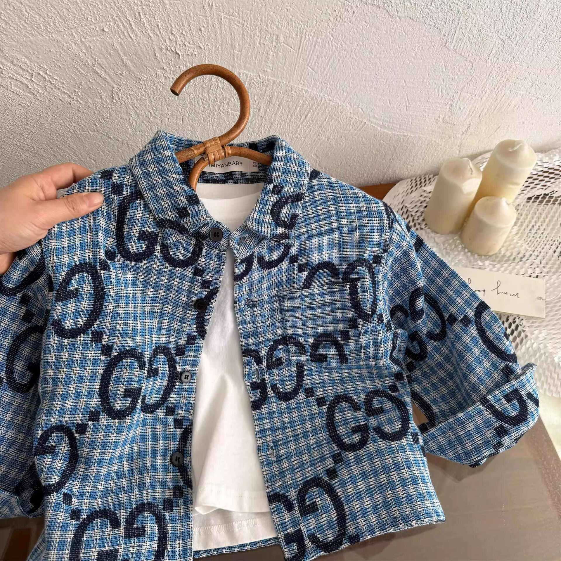 Camisas de mangas largas para niños de estrellas redondas de primavera 2025 camisas de moda de moda para niños y niñas bebés de impresión completa chaqueta a cuadros
