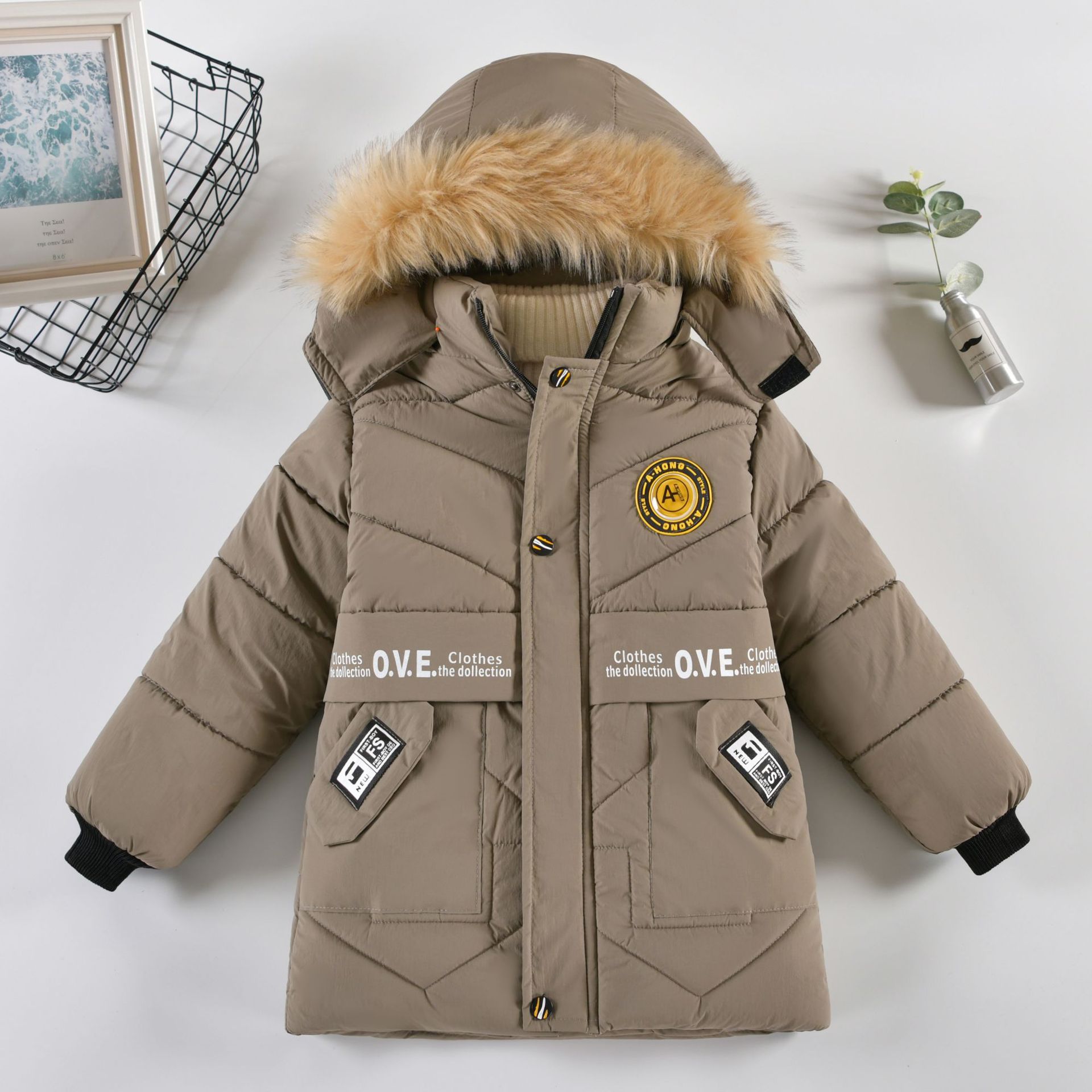 Ropa de invierno para niños engrosada ropa acolchada de algodón de moda abrigo de invierno para niños de longitud media estilo occidental cálido nueva chaqueta acolchada de algodón moda