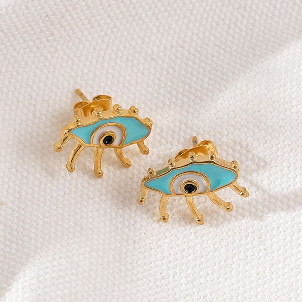 1 Pair Classic Style Devil's Eye Asymmetrical Enamel Plating Stainless Steel Ear Studs display picture 2