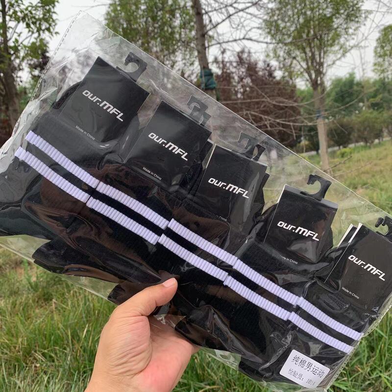 2023 autumn and winter new men's and women's sports socks solid color low stockings black and white net bag classic Suwan same style socks wholesale