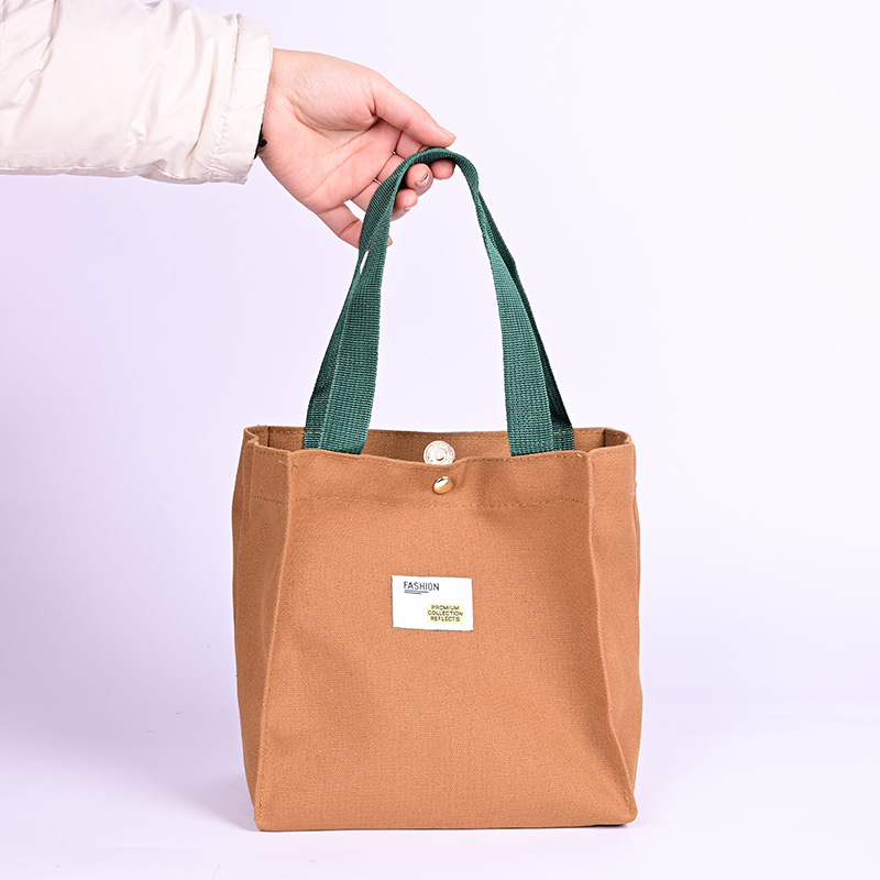 百搭简约手提帆布袋女单肩包托特包磁扣出行随身收纳储物带饭盒包