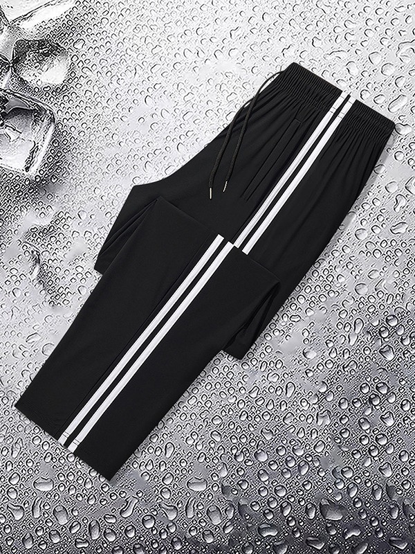 Fábrica de venta directa de nuevo verano de hielo de tamaño grande tres barras pantalones largos para hombres sueltos ociosos ultra delgados moda