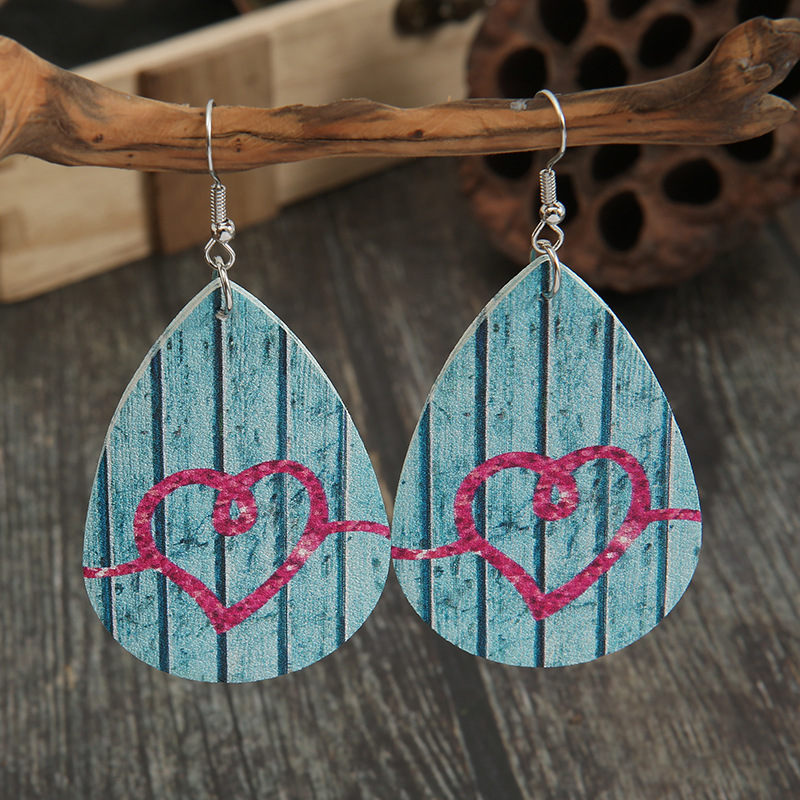 New Valentine's Day Retro Vertical Pattern Double-sided Leather Earrings Wholesale display picture 1