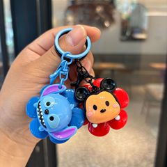 ミッキーのミニーが回転する太陽の花の漫画のキーホルダーのスティッチの子供のかばんのペンダントの子供機の贈り物の卸売り