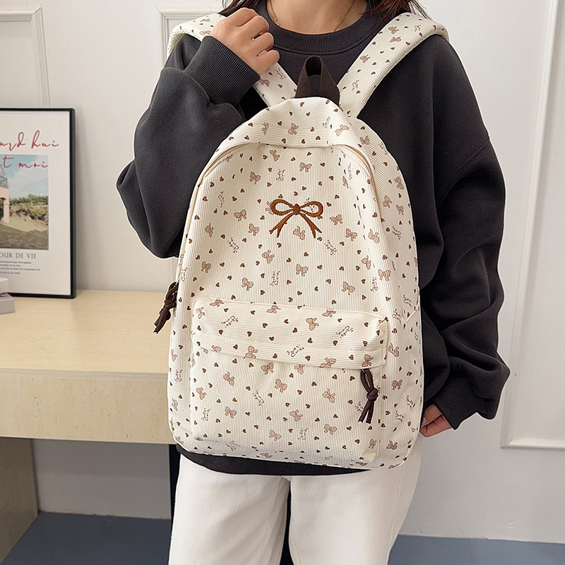 2026新款学生双肩包女生学院风蝴蝶结碎花旅行背包校园中学生书包