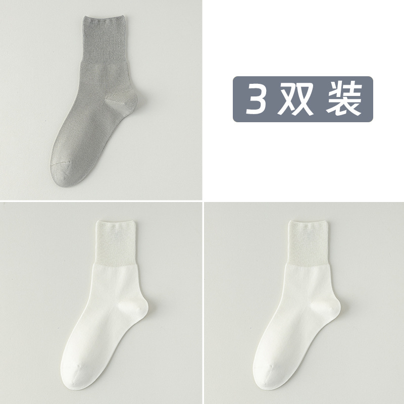 Calcetines de algodón de color sólido para hombres primavera, otoño y invierno en una máquina sin costura de hueso anti-balling embalaje independiente de calcetines de algodón