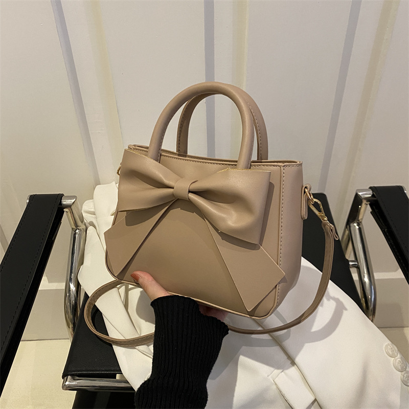 Bolso de mano con lazo simple de moda suave 2024 primavera y verano nuevo color sólido bolso de mensajero de hombro coreano bolso femenino