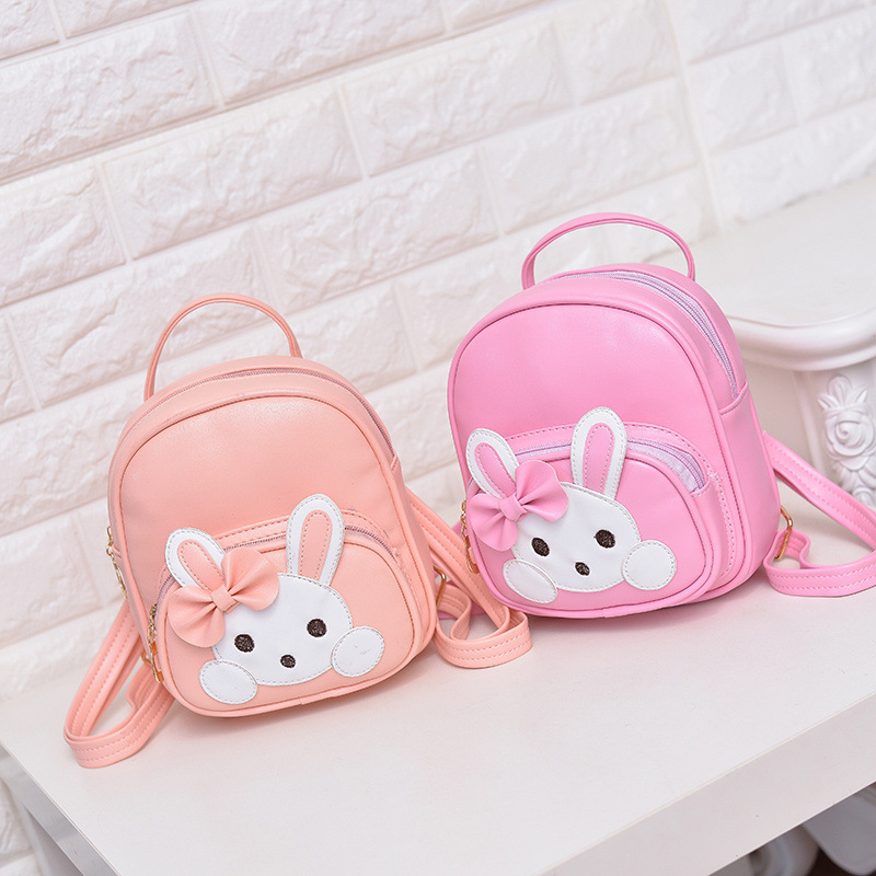 Versión coreana para niños de moda mini mochila princesa niña linda mochila de cuero jardín de infantes dibujos animados salida pequeña mochila escolar