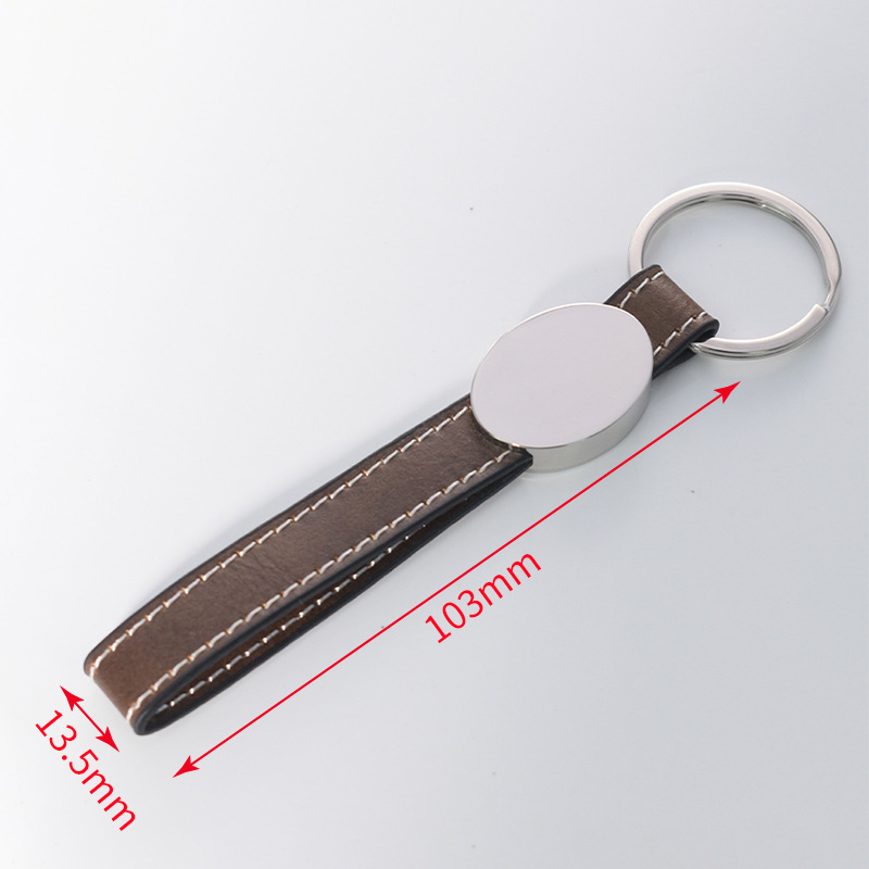 Transfronterizos en blanco spot embrión láser de cuero llavero de metal cuero colgante de automóvil personalizado regalos de negocios de alta calidad