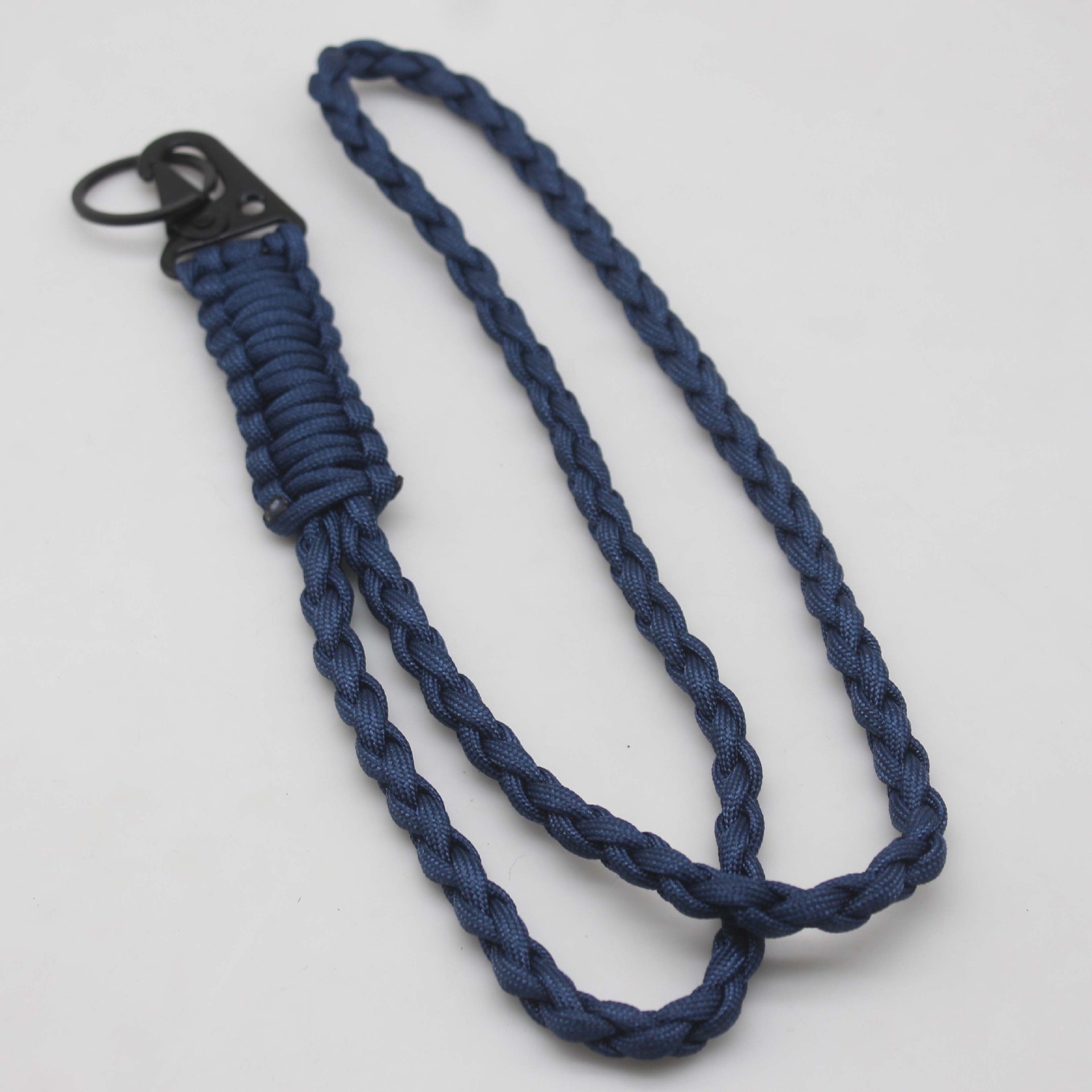 Venta caliente cordón tejido paraguas cuerda cuello cordón teléfono móvil llavero tejido siete núcleos paraguas cuerda acampar al aire libre emergencia