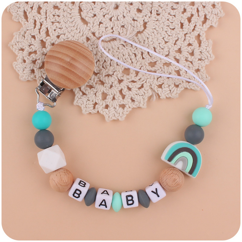 Bebé suministros de dibujos animados silicona arco iris chupete cadena creativa silicona mordedura cola molar cadena anti-gota cadena