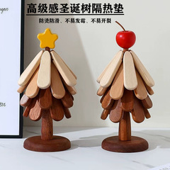 クリスマスは木の断熱マットの高級感があります。