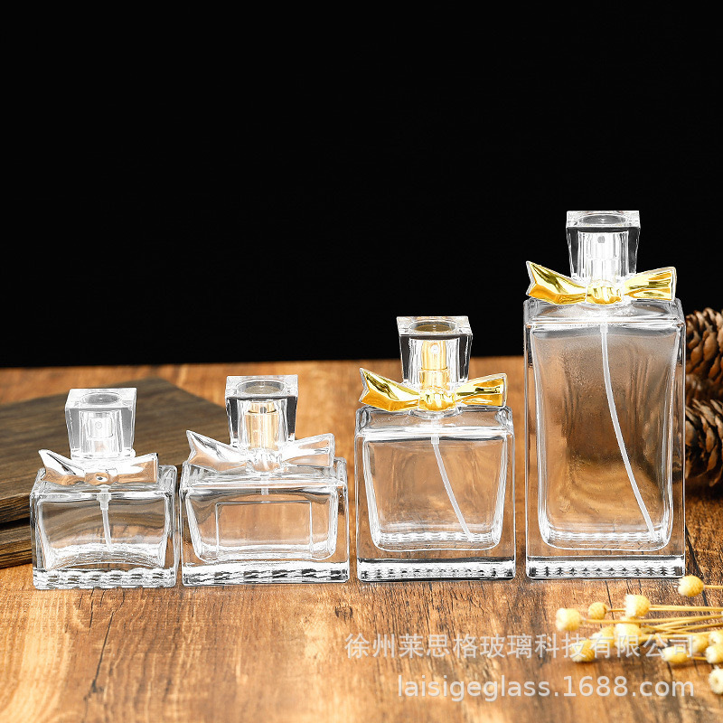 スポット卸売透明ガラス香水瓶 30 ミリリットル 50 ミリリットルフレグランス詰め替えボトルポンプヘッド空ボトル絶妙な包装|undefined