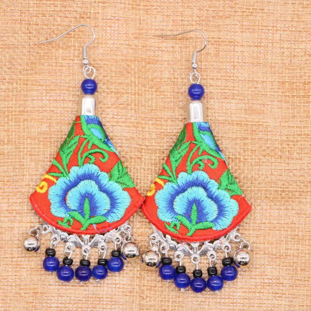 Blue flowers on red background