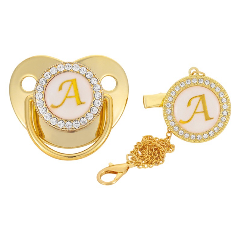 Venta directa de fábrica para niños chupete dorado destete artefacto bebé chupete boca letras A- Z