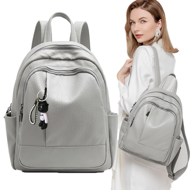 包包女2021新款时尚软皮拼接双肩包女韩版百搭挂饰背包手提旅行包