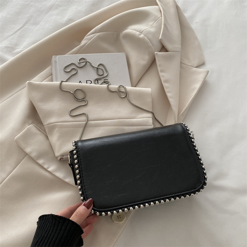 Este año, bolsos de diseño de moda para mujeres 2024, bolsos pequeños de nicho de cadena de moda, bolsos de hombro inclinados.