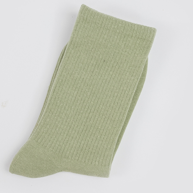 Calcetines de mujer para primavera y otoño, calcetines de algodón de color liso, versátiles y a la moda, calcetines holgados, calcetines de longitud media, calcetines deportivos que absorben el sudor, venta al por mayor.