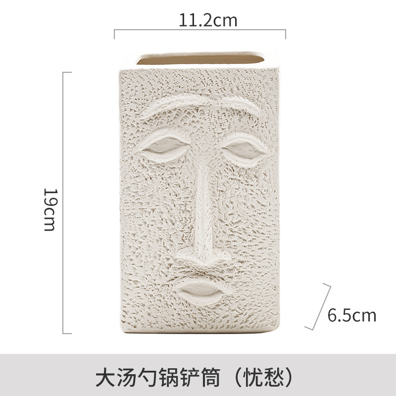 Venta directa de fábrica Soporte de tubo de palillos simple Tubo de cerámica de lujo ligero Adornos cuadrados Cara humana creativa nórdica Tubo de almacenamiento abstracto image 10