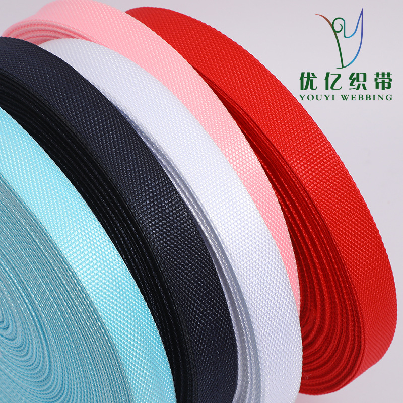 Fabricante mayorista de cintas de polipropileno coloridas, cinta de poliéster espigada engrosada, correas duraderas para bolsos, ribetes y accesorios textiles.