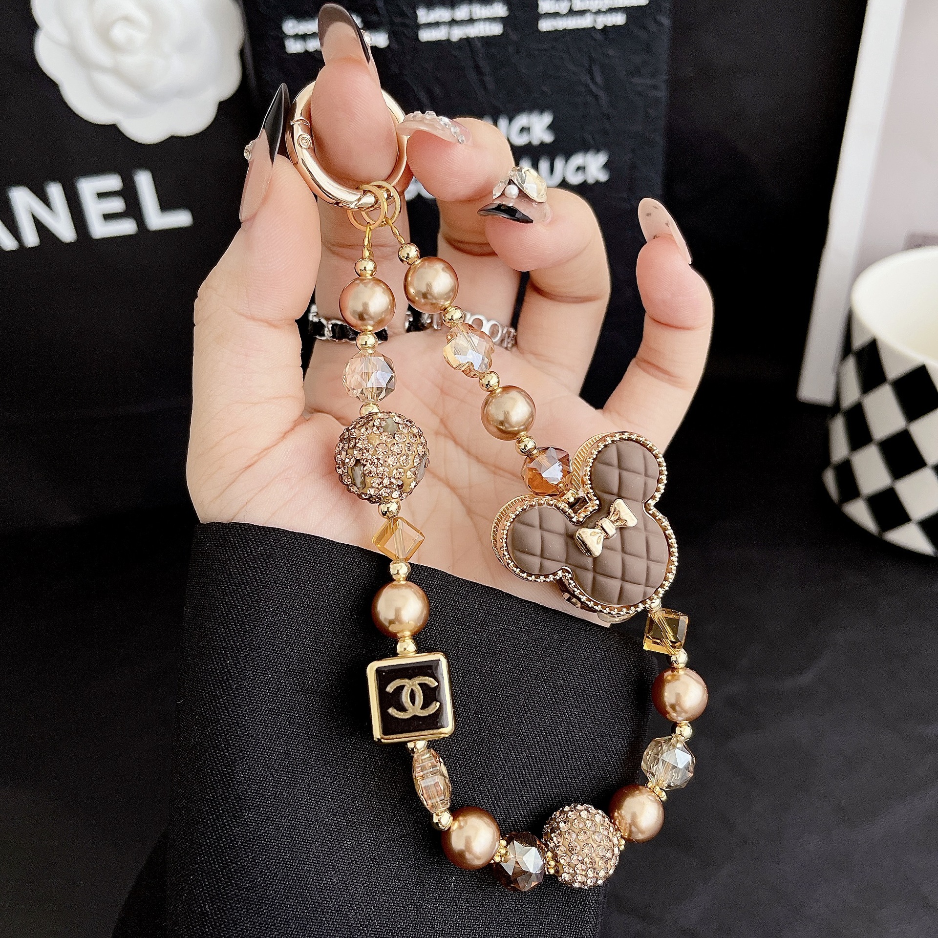 Hecha a mano y de alta calidad, colgante de teléfono móvil, pulsera de moda de micromecha, colgante de teléfono móvil corto.