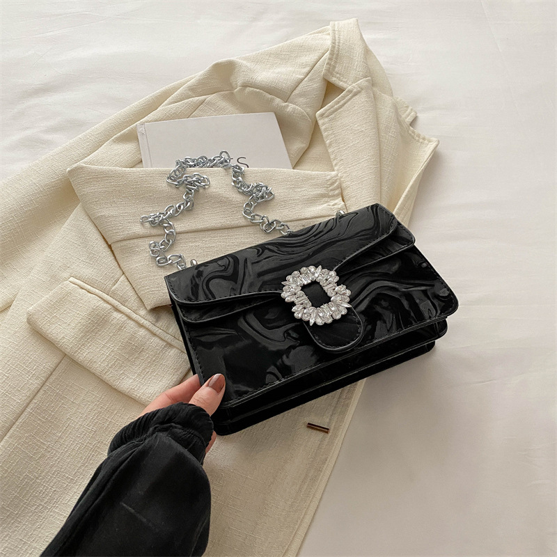 Moda simple temperamento coreano cadena de hombro bolso de mochila para mujeres 2024 primavera nueva bolsa de diamantes de estilo extranjero