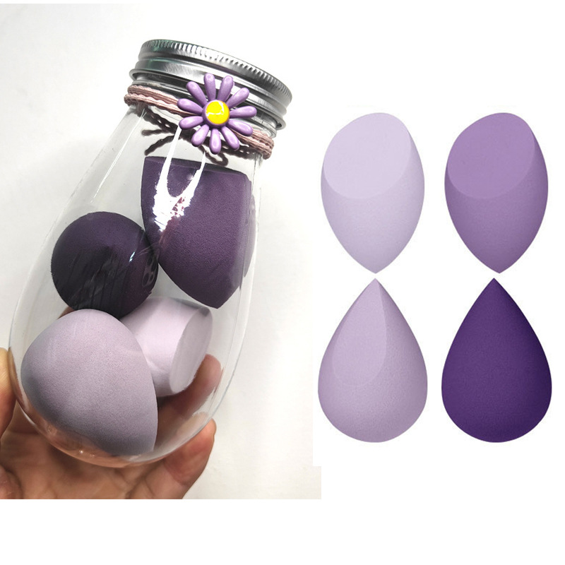 Traje de viaje portátil polvo puff PET embotellada belleza huevo súper suave embotellada mejorada esponja polvo puff leche té enlatado color