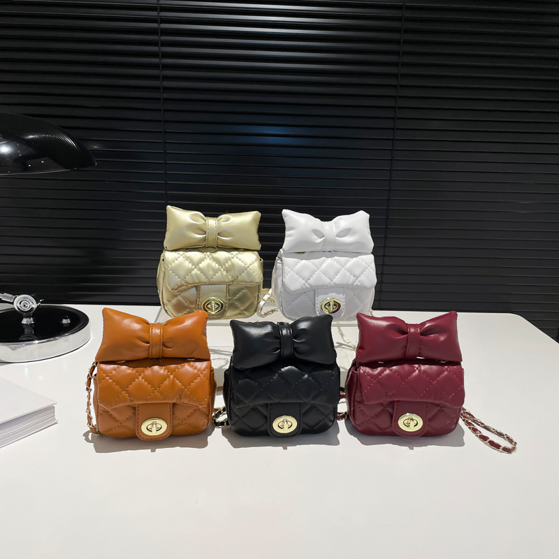 Bolsa de textura 2025 nueva moda extranjera cadena mochila primavera y verano nicho dulce arco mini bolso